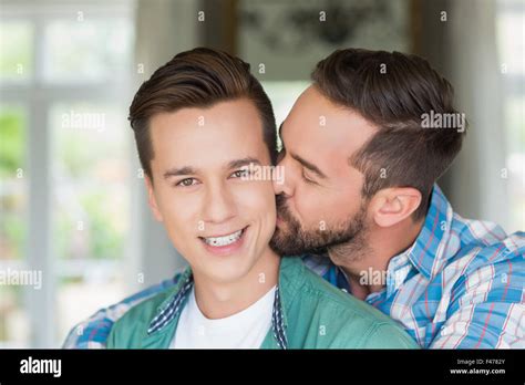 men kissing each other|Homosexual couple men kissing other Stock Photos .